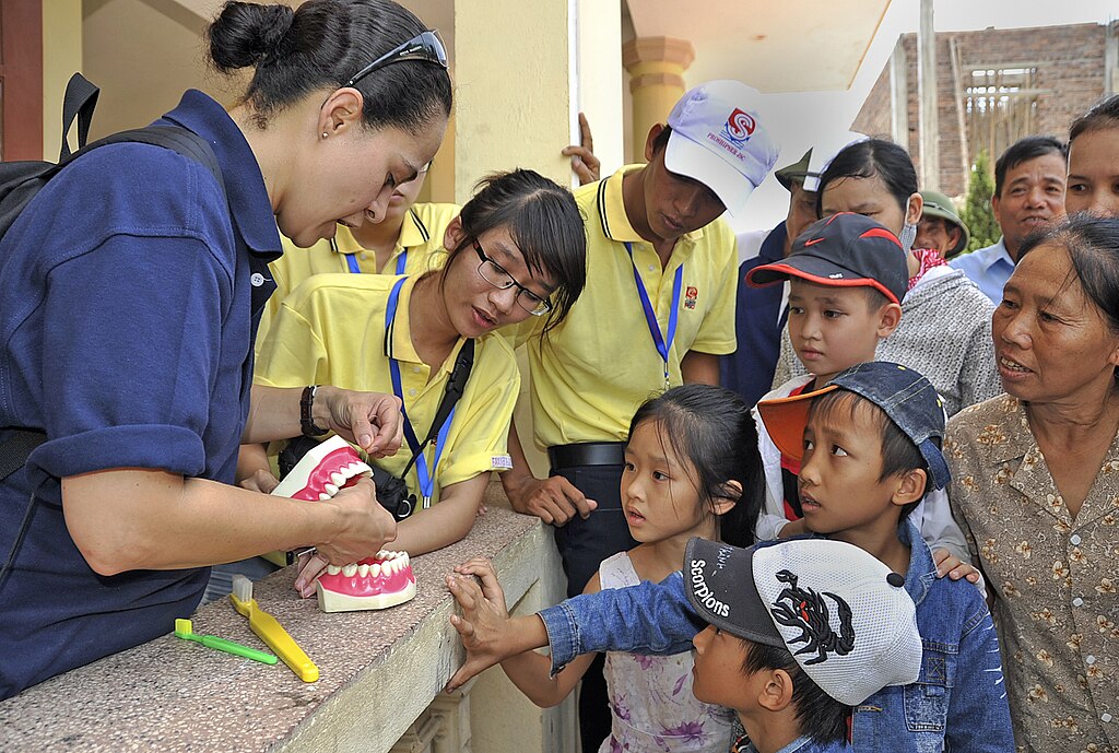 Social workers from the US Navy in Vietnam. Photo by Roadell Hickman. Source: Wikimedia Commons.