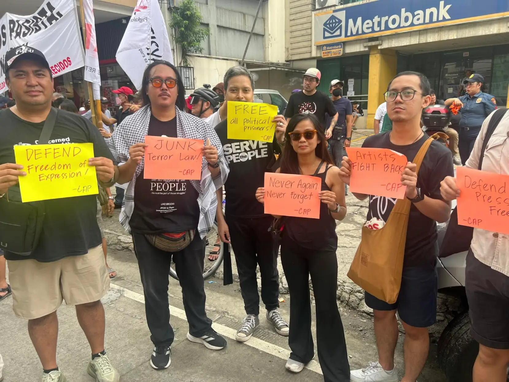 The group at a rally, pushing for some of the points of the Artists' Agenda.