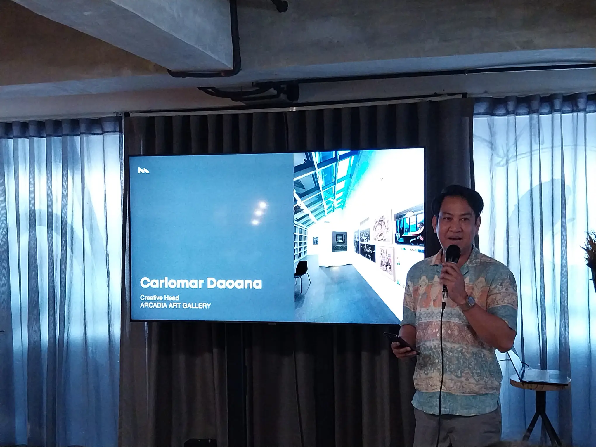 Carlomar Daoana from Arcadia Art Gallery, discussing their galelry for MoCAF 2025.