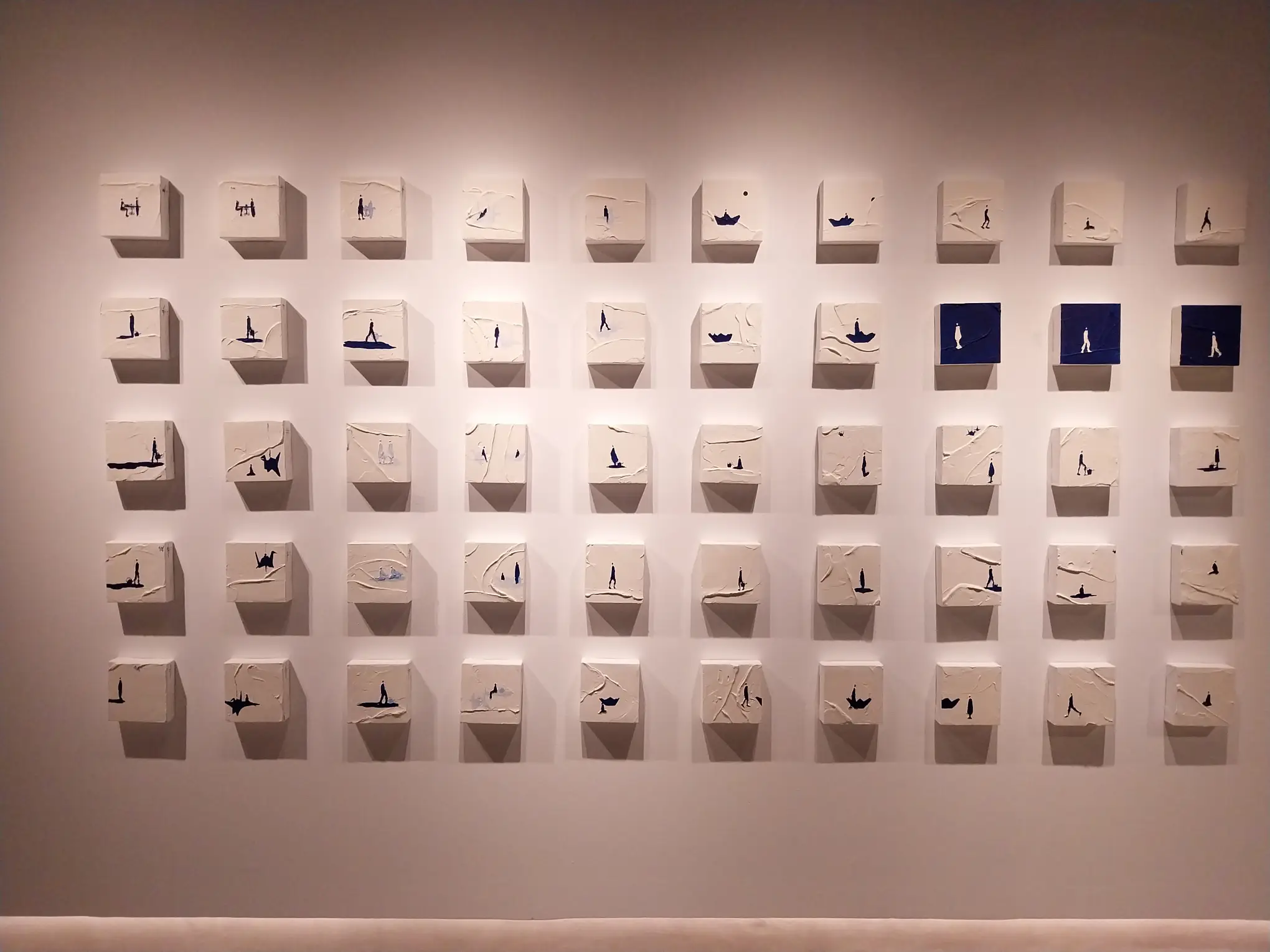 Multiple tiny works for "A Glimpse into the Dreamer's Reality" at Galerie Stephanie.