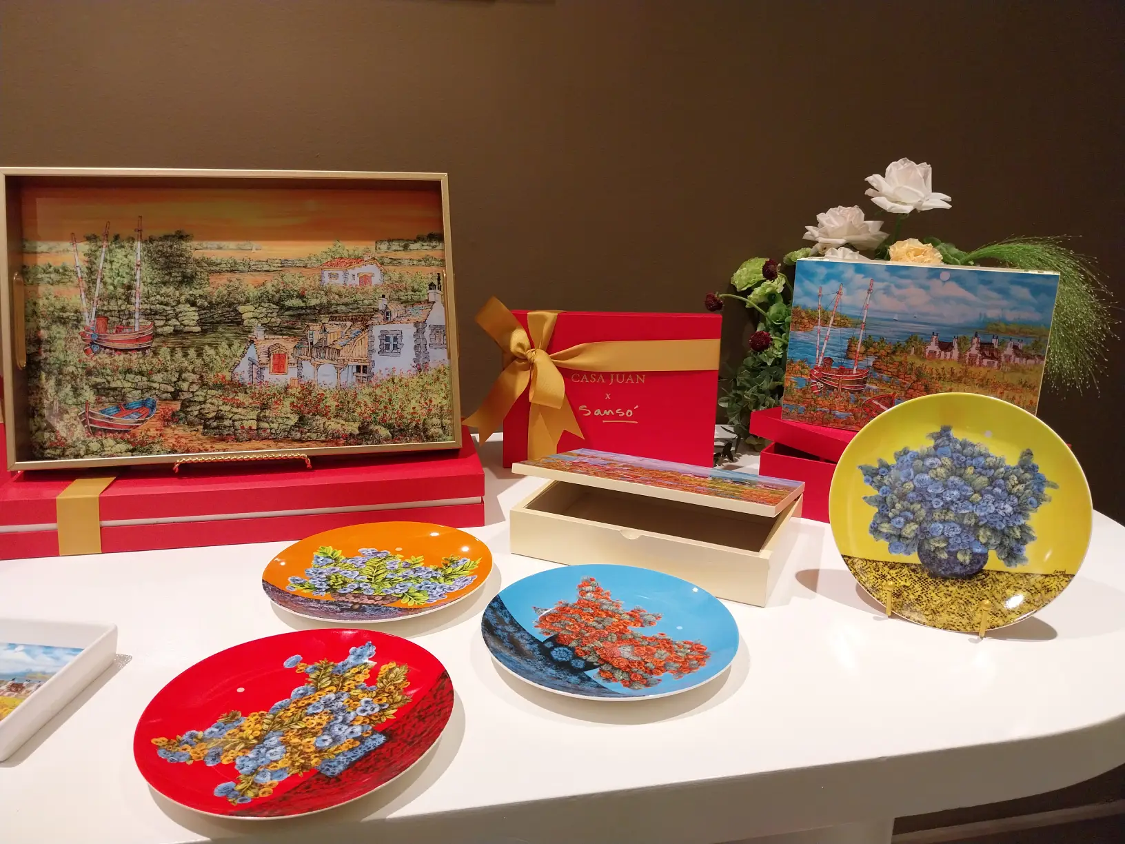 Some of the plates, serving trays, and other products for 'Casa Juan x Sansó.'