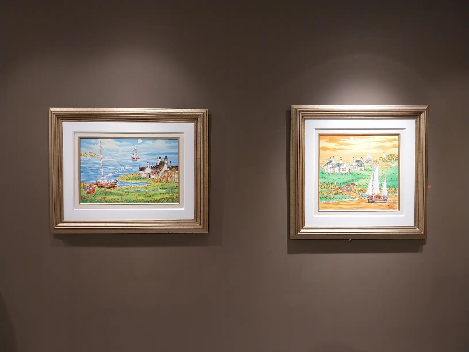 Close-up of paintings by Juvenal Sansó.